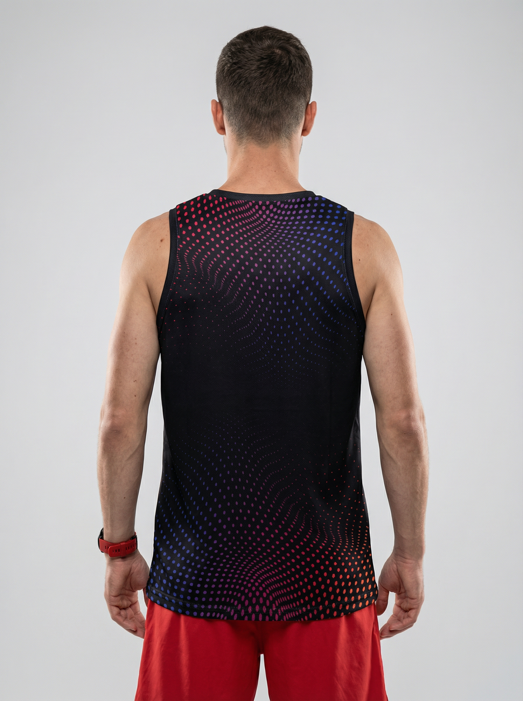 Playera deportiva de mujer — PLAYERA TANK HOMBRE SIN MANGAS NEGRA PUNTOS AZUL R — Kinestesia. Activewear premium.