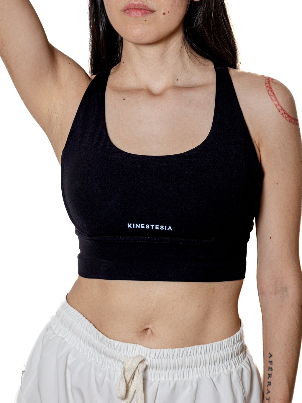 Top deportivo KINESTESIA — TOP NEGRO TIRANTE CRUZADO DE MUJER | Ropa Deportiva México