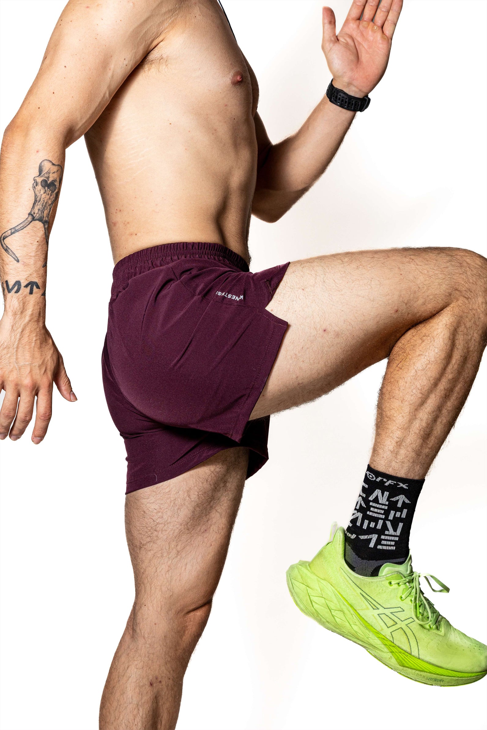 Short deportivo de mujer — SHORT PÚRPURA DE COMPETENCIA PARA HOMBRE — Kinestesia. Activewear premium.