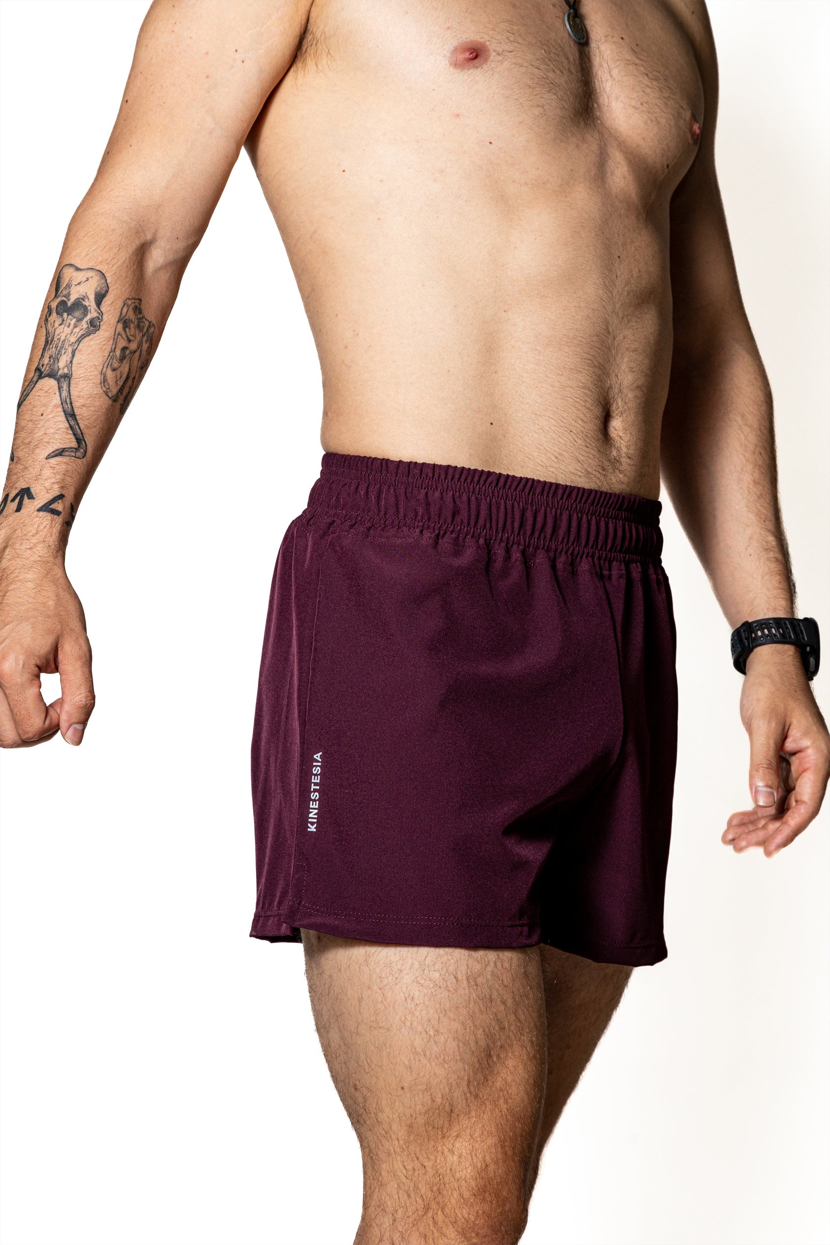 Compra short deportivo SHORT PÚRPURA DE COMPETENCIA PARA HOMBRE | Kinestesia — Moda deportiva.