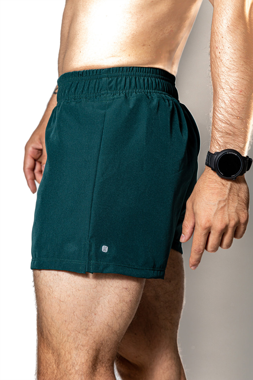 Compra short deportivo SHORT VERDE OSCURO DE COMPETENCIA PARA H | Kinestesia — Moda deportiva.