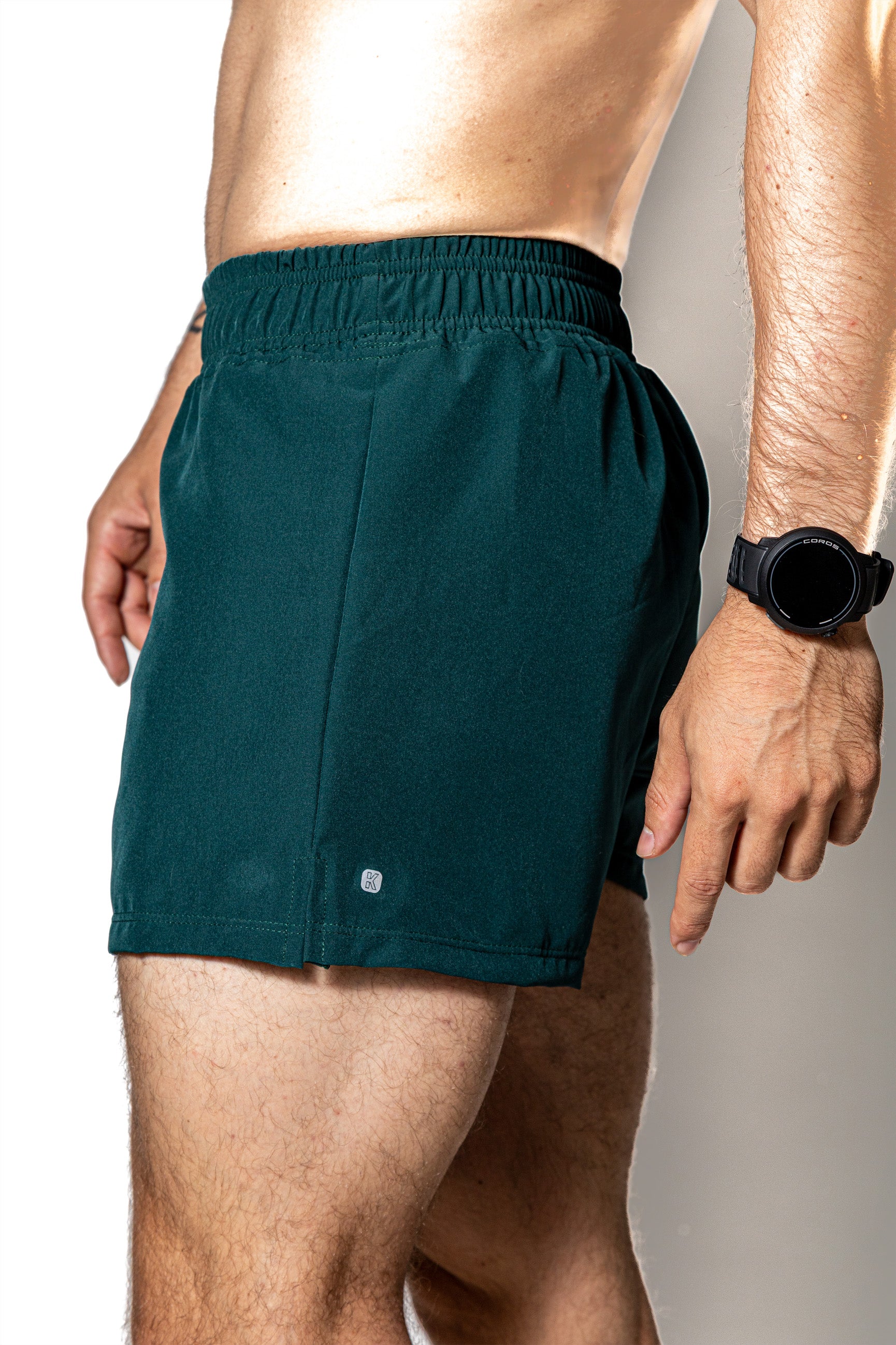 Compra short deportivo SHORT VERDE OSCURO DE COMPETENCIA PARA H | Kinestesia — Moda deportiva.