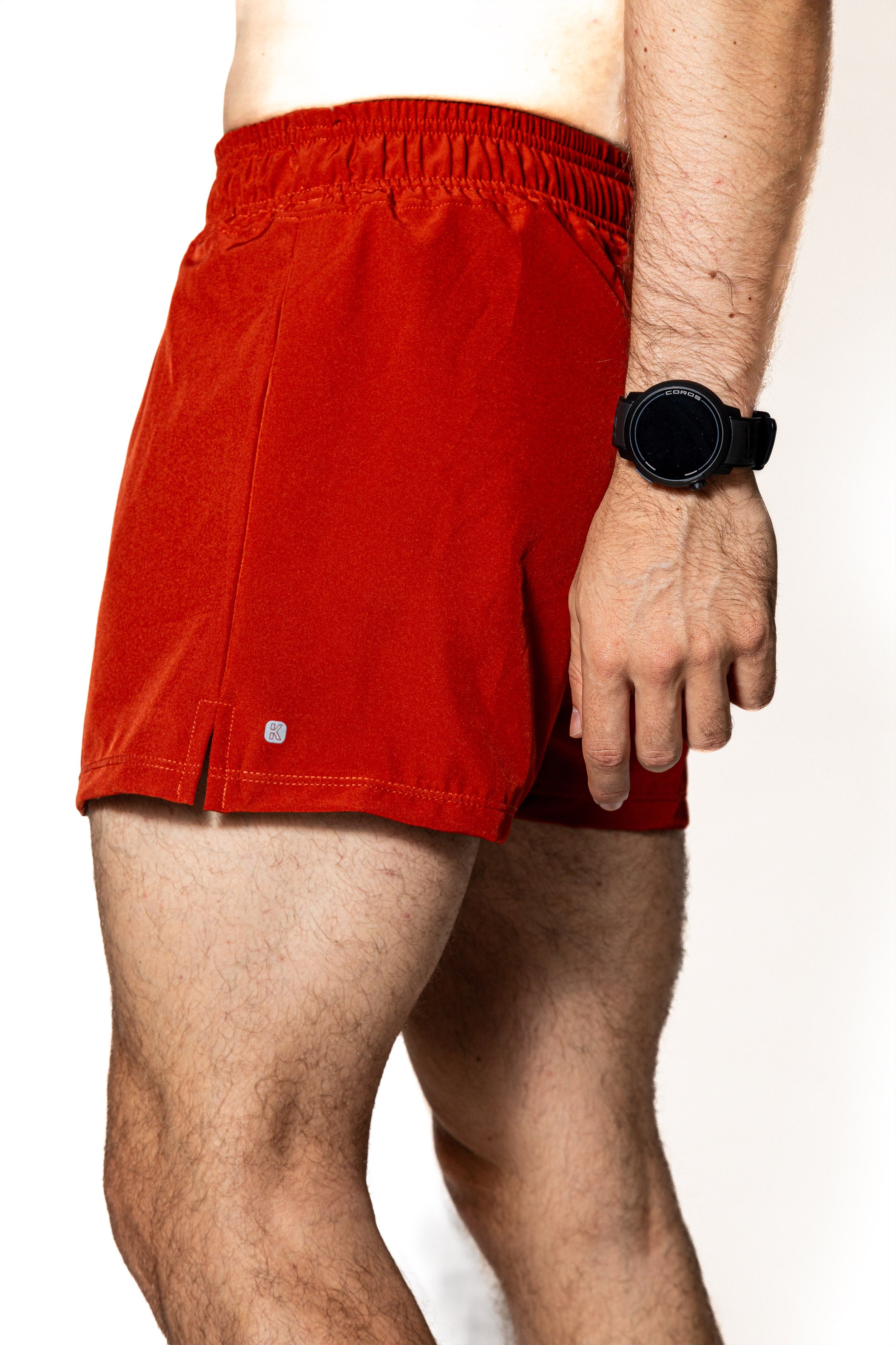 Compra short deportivo SHORT TERRACOTA DE COMPETENCIA PARA HOMB | Kinestesia — Moda deportiva.