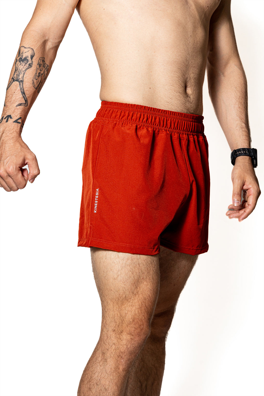 Short deportivo premium — SHORT TERRACOTA DE COMPETENCIA PARA HOMBRE — Kinestesia México.