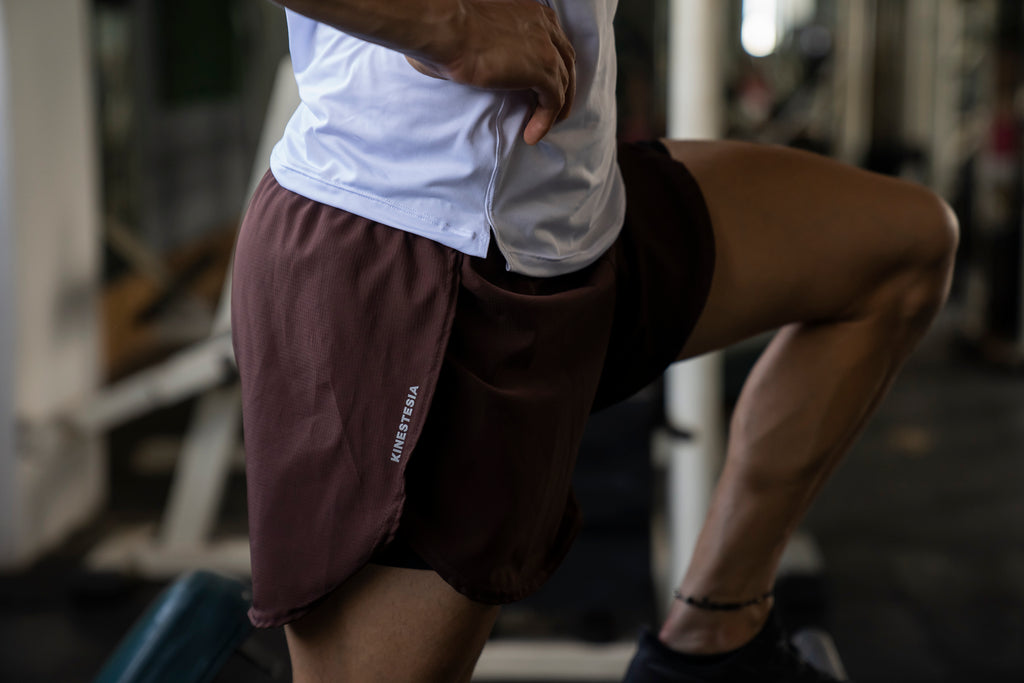 RUNNING SHORT MARRÓN MUJER UNISEX HOMBRE