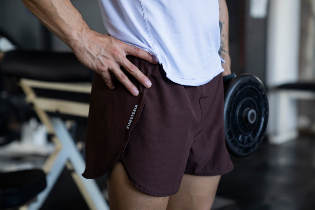 RUNNING SHORT MARRÓN MUJER UNISEX HOMBRE