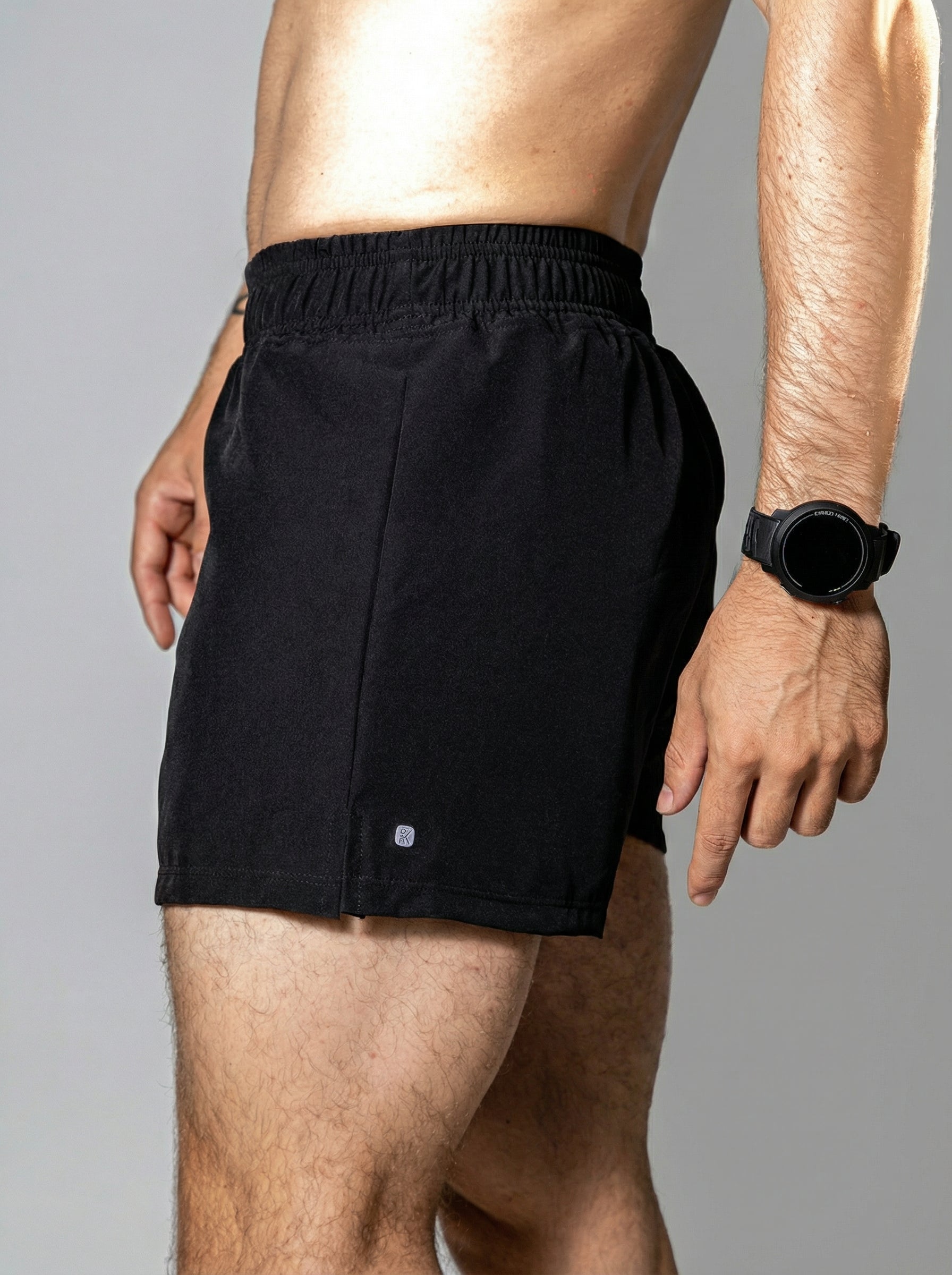 Short deportivo de mujer — SHORT NEGRO DE COMPETENCIA PARA HOMBRE — Kinestesia. Activewear premium.